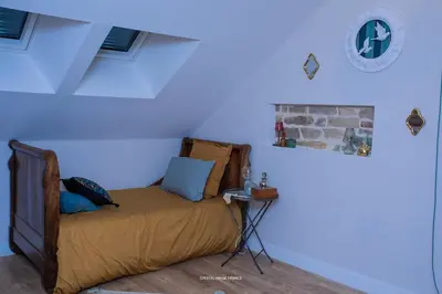 Un ou plusieurs lits dans un hébergement de l'établissement La Maison Laborey - Gîte de la Combe