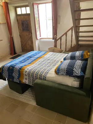 Un ou plusieurs lits dans un hébergement de l'établissement Maison authentique