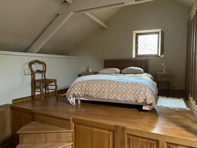 Un ou plusieurs lits dans un hébergement de l'établissement Maison authentique