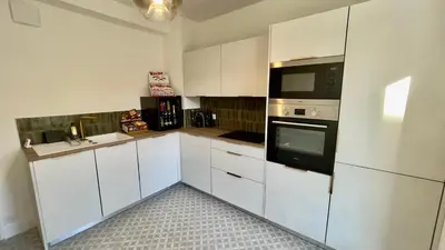 Cuisine ou kitchenette dans l'établissement Le Richebourg - Place Wilson, Centre Ville