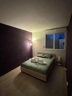 Un ou plusieurs lits dans un hébergement de l'établissement Appartement Cosy