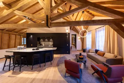 Coin salon dans l'établissement Les Suites by Cave Vauban