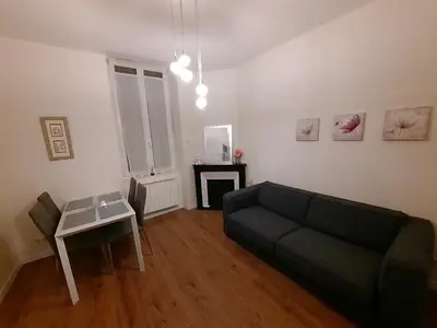 Coin salon dans l'établissement Le Hoche - Apt 4 Personnes, 1 ch, Proche Gare