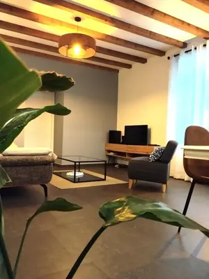 Télévision ou salle de divertissement dans l'établissement Maison Indépendante