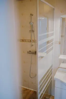Salle de bains dans l'établissement Le Côte Ouest - 2 Bedroom Apartment with Garage