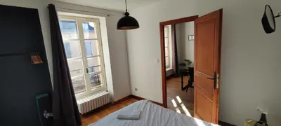 Un ou plusieurs lits dans un hébergement de l'établissement Le Courbet Fabulous 1-Bedroom