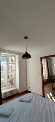 Un ou plusieurs lits dans un hébergement de l'établissement Le Courbet Fabulous 1-Bedroom