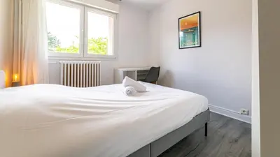 Un ou plusieurs lits dans un hébergement de l'établissement Lumina - Spacieux & comfortable