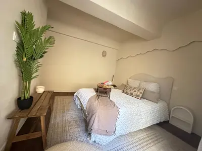 Un ou plusieurs lits dans un hébergement de l'établissement LES MALDIVES, T2, Balcon, Hyper centre Place aux Herbes