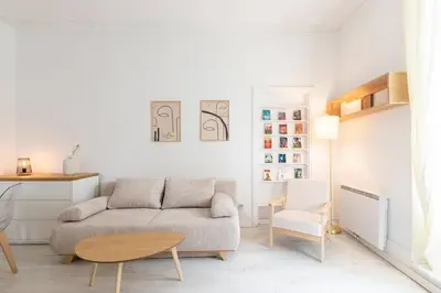 Coin salon dans l'établissement Appartement 4 personnes - Cité de la gastronomie