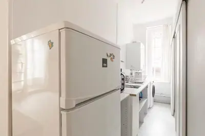 Cuisine ou kitchenette dans l'établissement Appartement 4 personnes - Cité de la gastronomie