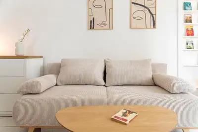 Coin salon dans l'établissement Appartement 4 personnes - Cité de la gastronomie