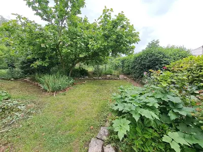 Jardin de l'établissement Ferme spacieuse climatisée, SPA & Pétanque