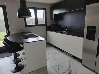 Cuisine ou kitchenette dans l'établissement Villa des étoiles