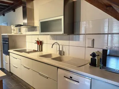 Cuisine ou kitchenette dans l'établissement Gite St Loup
