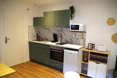 Cuisine ou kitchenette dans l'établissement Urban Oasis, Appartement Chic et Neuf