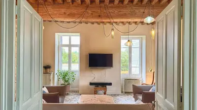 Télévision ou salle de divertissement dans l'établissement La Casa Do - Havre de Paix au Bord de L'eau