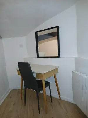 Télévision ou salle de divertissement dans l'établissement Appartement plein pied