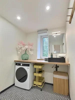 Cuisine ou kitchenette dans l'établissement Doux Murmures, appartement 73m2 calme et élegant, 2 chambres