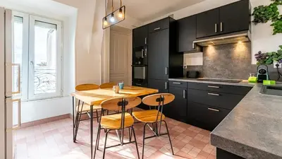 Cuisine ou kitchenette dans l'établissement Les Toits de Darcy - Dijon Centre historique