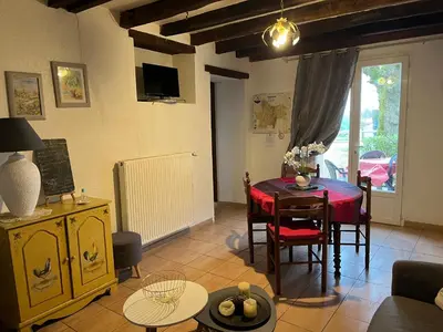 Télévision ou salle de divertissement dans l'établissement Gîte Le tilleul