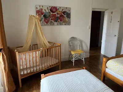 Un ou plusieurs lits dans un hébergement de l'établissement Gîte Les Lilas