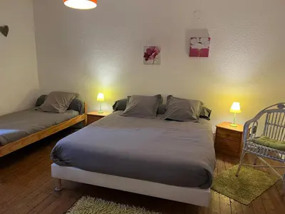 Un ou plusieurs lits dans un hébergement de l'établissement Gîte Les Lilas