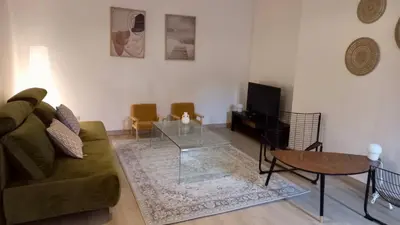 Coin salon dans l'établissement Les suites de Saint-Yves