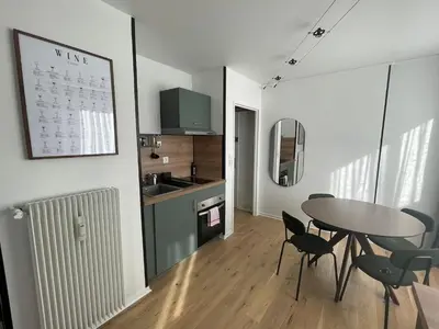 Cuisine ou kitchenette dans l'établissement Le Pinot - Centre-ville - Gare à 5 mn