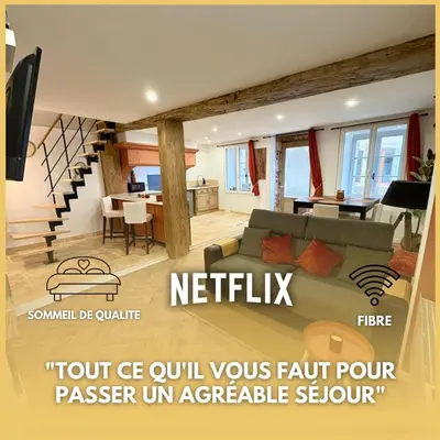 Télévision ou salle de divertissement dans l'établissement Le Domus Pesmois