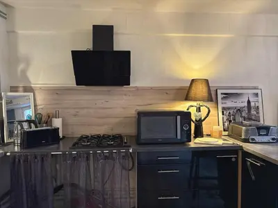 Cuisine ou kitchenette dans l'établissement Maison Beauté