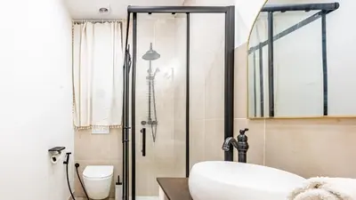 Salle de bains dans l'établissement Appartement cosy avec terrasse, accès gare Dijon à pied