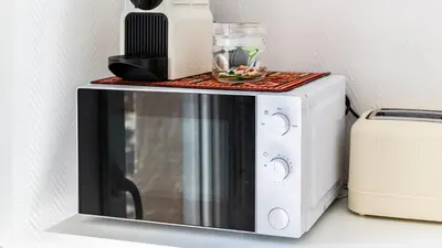 Cuisine ou kitchenette dans l'établissement Appartement cosy avec terrasse, accès gare Dijon à pied
