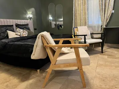 Coin salon dans l'établissement Ma Campagne SPA Suite