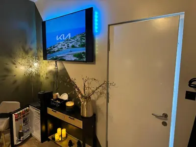 Télévision ou salle de divertissement dans l'établissement Ma Campagne SPA Suite