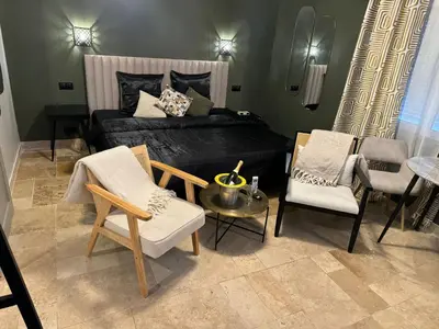 Coin salon dans l'établissement Ma Campagne SPA Suite