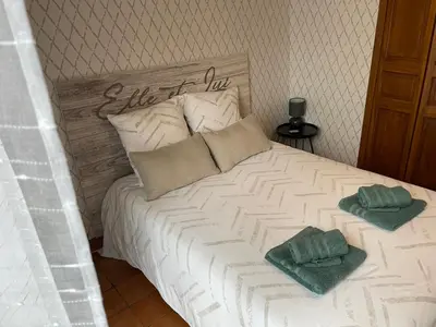 Un ou plusieurs lits dans un hébergement de l'établissement Chambre d'hôtes de l'Angeline