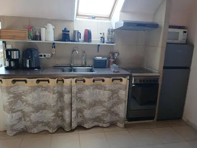 Cuisine ou kitchenette dans l'établissement Gite de hermitage