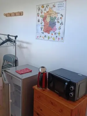 Cuisine ou kitchenette dans l'établissement Chambre au calme - Université
