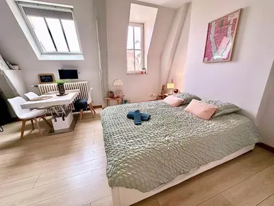 Un ou plusieurs lits dans un hébergement de l'établissement Le petit POTE' studio Dijon hyper centre