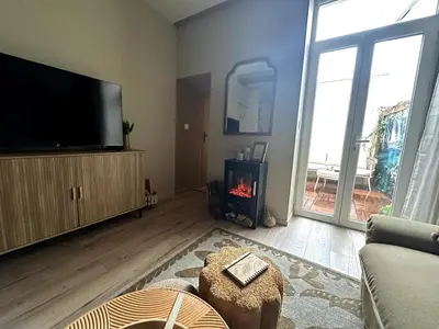 Télévision ou salle de divertissement dans l'établissement LE COTTAGE, T2, Hyper center, Terrasse