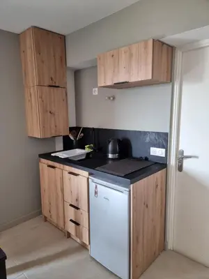 Cuisine ou kitchenette dans l'établissement Appartement au cœur des vignes