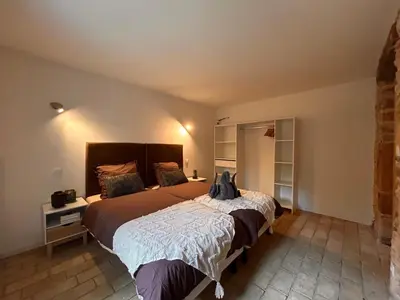 Un ou plusieurs lits dans un hébergement de l'établissement Le Coup de Coeur Terrasse Calme