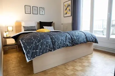Un ou plusieurs lits dans un hébergement de l'établissement 2 Appartements 