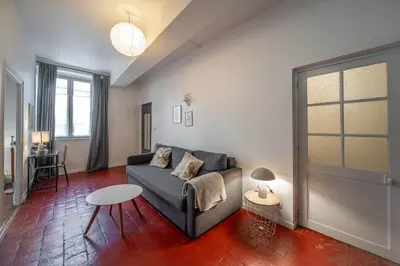Coin salon dans l'établissement L'appartement Cosy