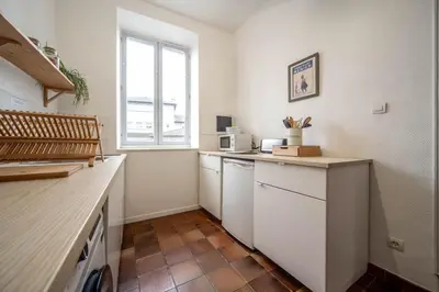 Cuisine ou kitchenette dans l'établissement L'appartement Cosy