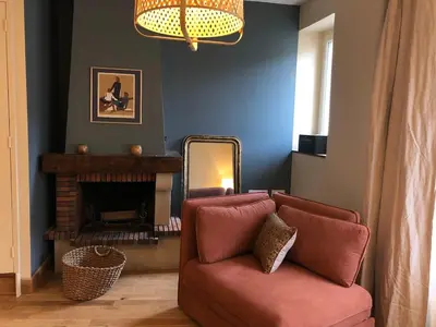 Coin salon dans l'établissement Maison d'Alice - Centre-ville de Cluny avec parking