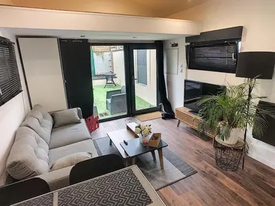 Coin salon dans l'établissement Welcome Home