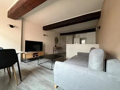 Télévision ou salle de divertissement dans l'établissement La Pause Cosy