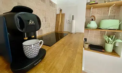 Cuisine ou kitchenette dans l'établissement La Chouette Blanche, hypercentre